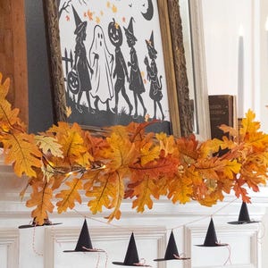 Witch hat Halloween printable decor, paper witch hat DIY craft, Halloween spooky hat garland, printable witch hat art, witchy Halloween home decor, Halloween witch banner, mini paper cone hat printable, witch hat pattern for crafts, Halloween witch decor printable, printable DIY Halloween