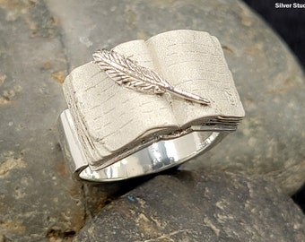 Old Book with feather Pen Ring
