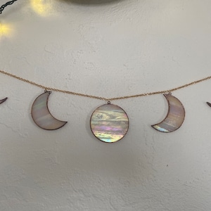 Moon phases stained glass wall hanging, iridescent white stained glass, copper finish.  Moon phases boho hole decor