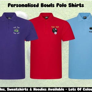 May include: Three polo shirts in purple, red, and light blue, each with a collar and short sleeves. The shirts feature embroidered bowls graphics and the text "Your Text." The image includes the text "Personalised Bowls Polo Shirts" and "Polos, Sweatshirts & Hoodies Available - Lots Of Colours."