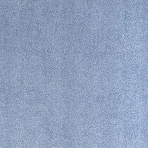 May include: A close-up of a light blue, textured fabric. The fabric has a subtle, grainy appearance.