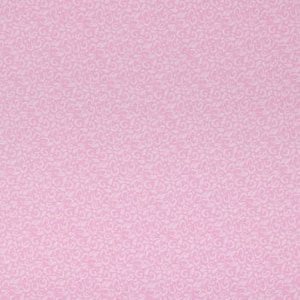 May include: A pink fabric with a white swirl pattern.