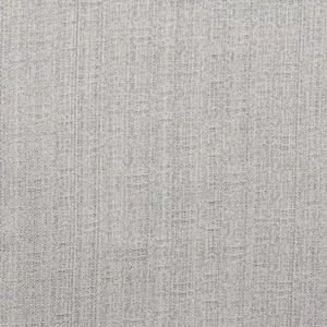 May include: A close-up of a light gray fabric with a textured weave. The material has a subtle, mottled appearance, with variations in tone creating depth. The fabric's surface is evenly lit, highlighting the intricate texture.