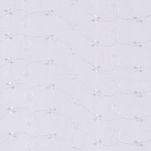 May include: White fabric with a delicate floral pattern of small white flowers and vines. The fabric has a subtle sheen and a smooth texture.