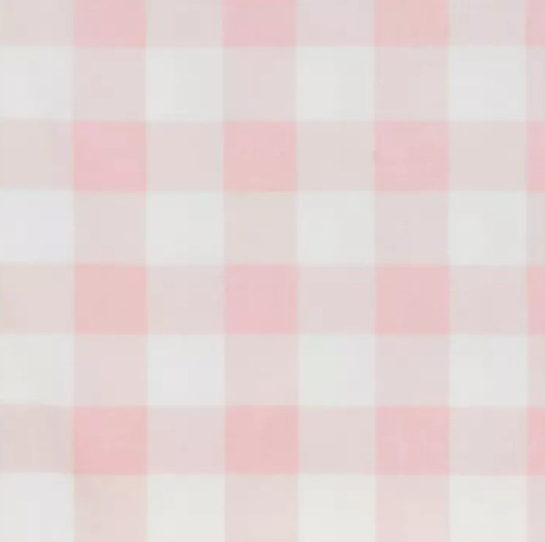 May include: Pink and white gingham fabric with a checkered pattern.