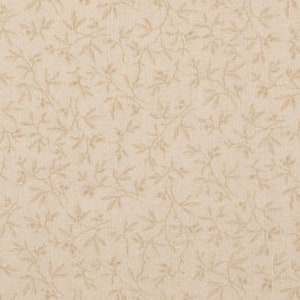 May include: A beige fabric with a delicate pattern of small brown leaves and branches.