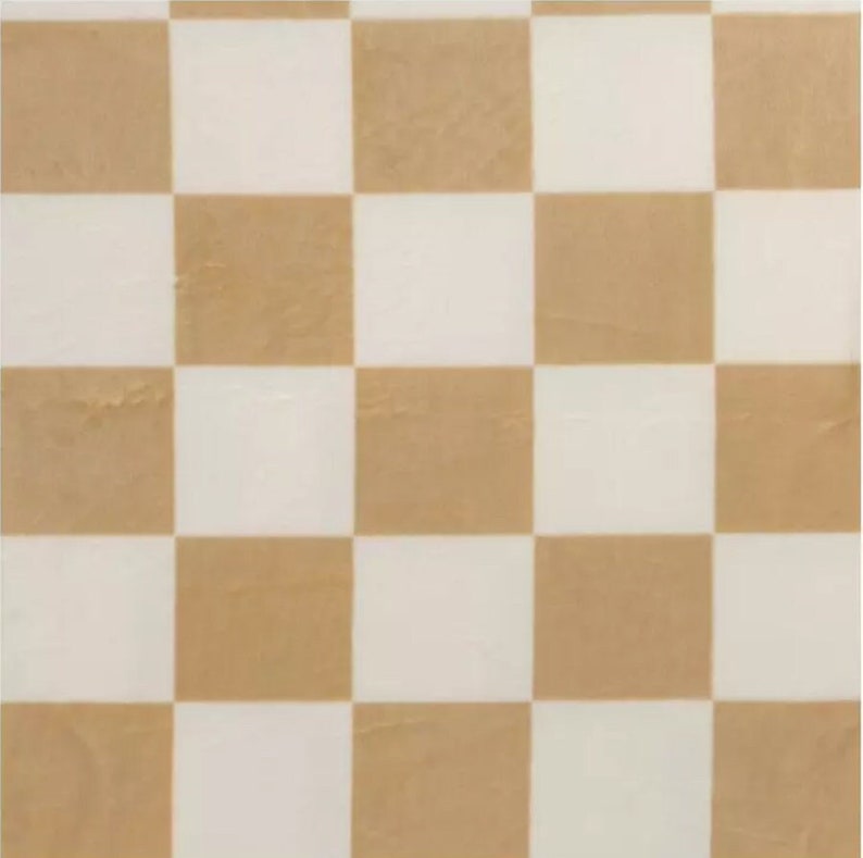 May include: A brown and white checkered pattern. The squares are evenly sized and arranged in a grid.