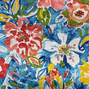 May include: Watercolor floral pattern featuring large flowers in shades of red, orange, yellow, and blue. The design includes detailed leaves and petals, creating a vibrant and artistic textile print. The background is white.