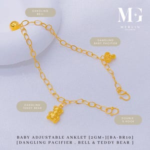 May include: A gold baby adjustable anklet with a dangling bell, baby pacifier, and teddy bear charms. The anklet features a double S hook clasp and is made of gold. The text on the image reads "Baby Adjustable Anklet".