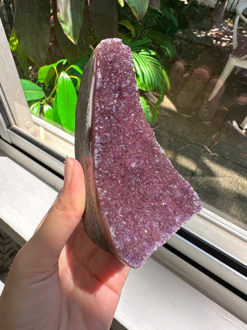 Beautiful Raspberry Sugar Amethyst Geode. Geode is a Special Treasure Symbolizing Hard Exterior
