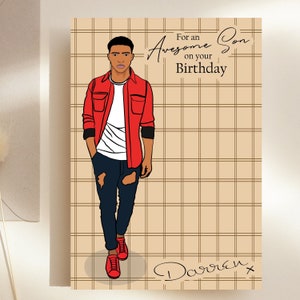 May include: A birthday card with a cartoon illustration of a man wearing a red shirt, blue jeans, and red sneakers. The card has a checkered background and the text "For an Awesome Son on your Birthday" and "Darren x".