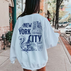 Bluzy New York Bluza New Yorker Bluza z kapturem New York Koszulka New York Koszulka East Coast Koszulka New York Lover Prezent z tyłu Nadrukowany oversize Okrągły dekolt