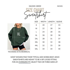 May include: A size chart for a Gildan 18000 sweatshirt, with measurements in inches. The chart includes sizes S to 5XL, with width, length, and sleeve measurements. The model in the image is 5'8" and wearing an XL.