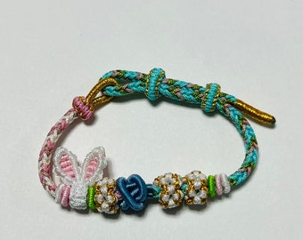 rabbit woven bracelet, inspired by Buddhist Tibetan knots, offering a delicate braided rope design perfect for women’s gifts