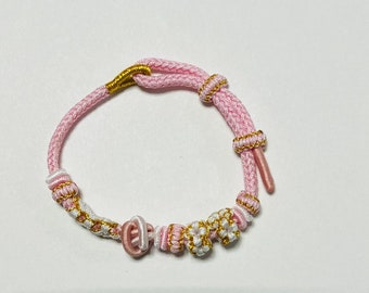 woven flowers bracelet, inspired by buddhist tibetan knots ,offering a delicated rope design perfect for women's gifts