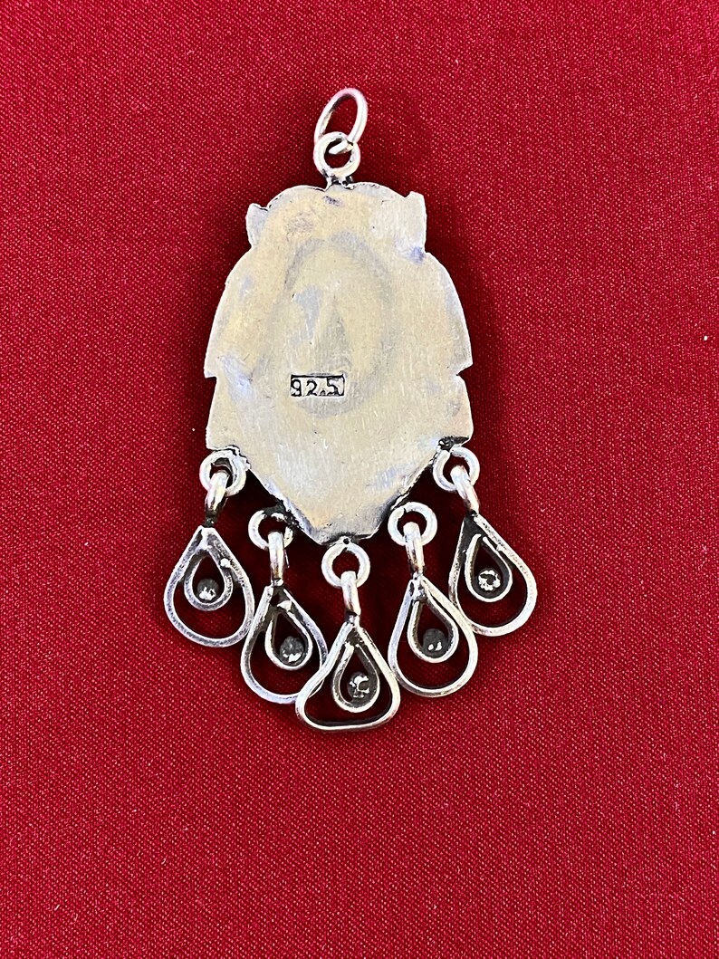 Former Rajasthane Vintage pendant in solid silver with an engraving of two Peacock Bird