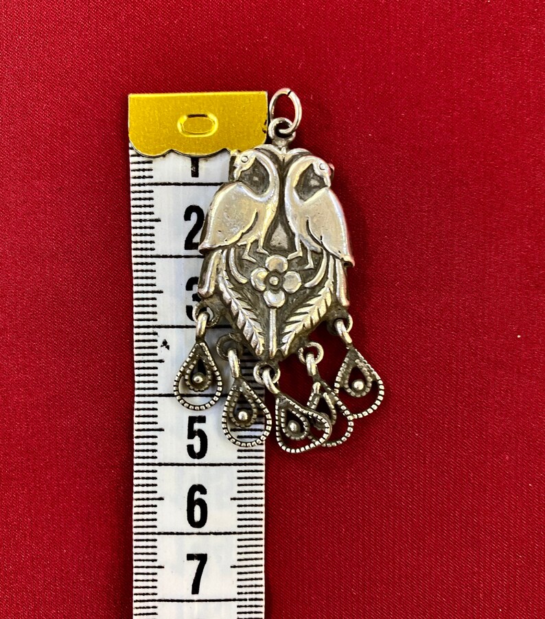 Former Rajasthane Vintage pendant in solid silver with an engraving of two Peacock Bird