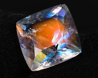 6.65 Carat Cushion Cut Moonstone: Blue & Red Fire, Madagascar Origin