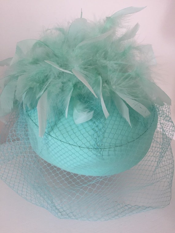 Vintage pill box hat with feathers and veil