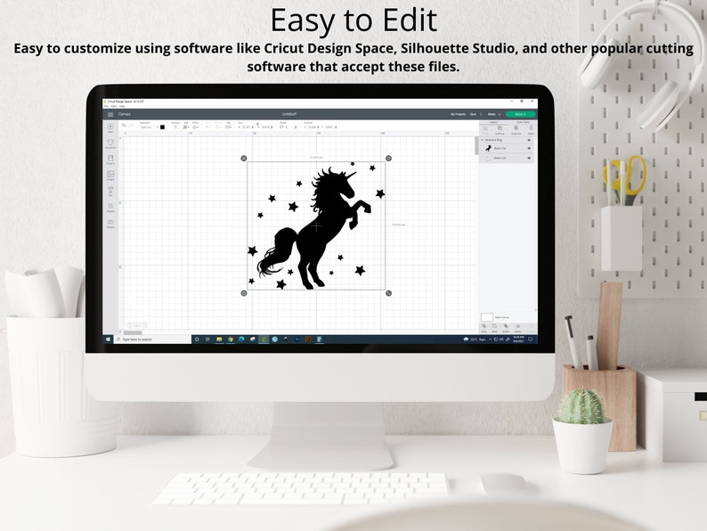 Puede incluir: Una pantalla de ordenador que muestra una silueta negra de un unicornio con estrellas sobre un fondo de cuadr&iacute;cula blanca. El texto "Easy to Edit" se muestra en la parte superior de la pantalla.