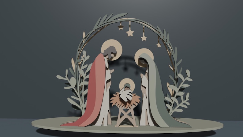 May include: A layered wooden nativity scene featuring stylized figures of two adults standing on either side of a central manger with a baby. The figures are framed by an arched structure decorated with leaf motifs and hanging star shapes.