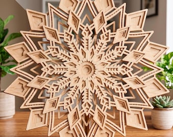 May include: A wooden, layered snowflake decoration. The natural wood tones create a warm, inviting aesthetic. The intricate design features geometric shapes and a central spiral, perfect for seasonal decor. The snowflake is approximately 12 inches in diameter.