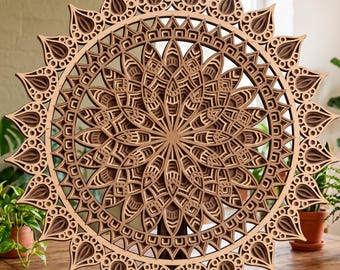 May include: A layered wooden mandala wall art piece. The intricate design features concentric circles and floral patterns, with a natural wood finish. The artwork is displayed on a wooden stand, showcasing its depth and detail. The piece is approximately 24 inches in diameter.