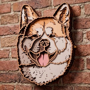 May include: A multi-layered wooden wall art piece depicting the head of an Akita dog. The design features stacked laser-cut wood panels in shades of tan, cream, brown, and pink, creating a three-dimensional effect with visible depth and texture.