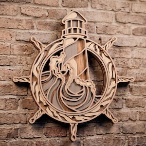 May include: A multi-layered wooden wall art piece featuring a ship's wheel frame surrounding a central lighthouse and crashing ocean waves. The design is constructed from stacked wood panels in varying natural brown tones, creating a 3D effect.