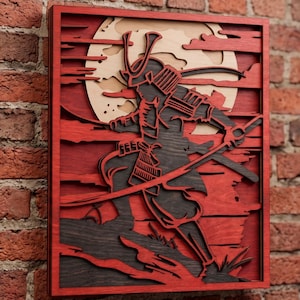May include: A multi-layered wooden wall art piece featuring a dark silhouette of a samurai in traditional armor holding a sword. The design includes a large beige moon set against a deep red background with horizontal layered wood cutouts.