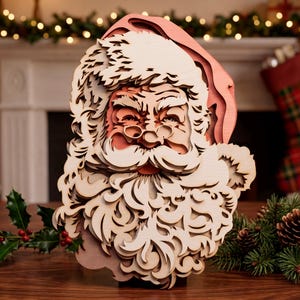 May include: A multi-layered wooden wall art piece depicting the face of Santa Claus. The design features intricate laser-cut details of a hat, bushy eyebrows, round spectacles, a mustache, and a long, flowing beard, all in natural wood tones.