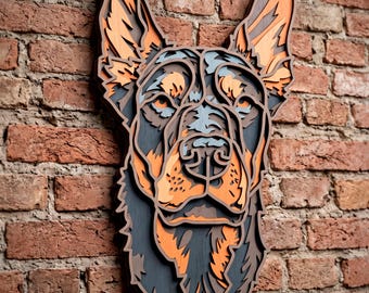 May include: A multi-layered wooden wall art piece shaped like a German Shepherd dog head. The design features stacked cutouts in shades of dark charcoal gray, light orange, and natural wood tones, creating a dimensional relief of the canine face.