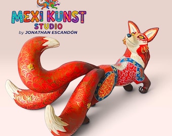 May include: A multi-tailed fox figurine featuring vibrant red, orange, and white hand-painted patterns with gold accents. The sculpture displays intricate floral and geometric designs across its body and tails. Text above reads MEXI KUNST STUDIO by JONATHAN ESCANDÓN.