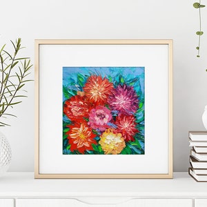 May include: A framed painting of a bouquet of colorful flowers, including red, pink, yellow, and orange, against a blue background.