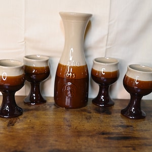 Vintage stoneware decanter and 4 wine glasses