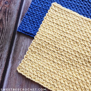 May include: Two crocheted dishcloths, one in a light blue color and one in a yellow color. The dishcloths are made with a textured stitch.