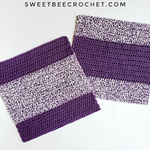 May include: Two purple and white striped crochet dishcloths. The dishcloths are made with a simple crochet stitch and have a textured look.