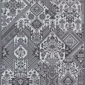 May include: Black and white cross-stitch pattern featuring geometric shapes, birds, deer, and floral motifs. The design includes the numbers "20" in two places. This intricate pattern is suitable for embroidery or needlepoint projects.