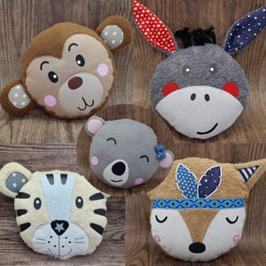 Gepersonaliseerde knuffelkussens of verwarmbare kussens met dierenmotieven in diverse designs.