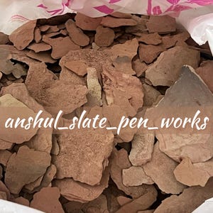 May include: A white plastic bag filled with roasted Multani crumbs. The bag is open and the crumbs are visible. The text "Roasted Multani Crumbs" and "anshul_slate_pen_works" are visible on the bag.