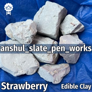 May include: Close-up of gray, edible clay rocks labeled "Strawberry Edible Clay" and "anshul_slate_pen_works".