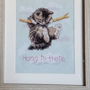 framed cross stitch picture