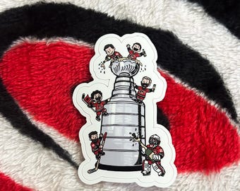 Carolina Hurricanes X Peanuts Climbing Stanley Cup-klistermärke