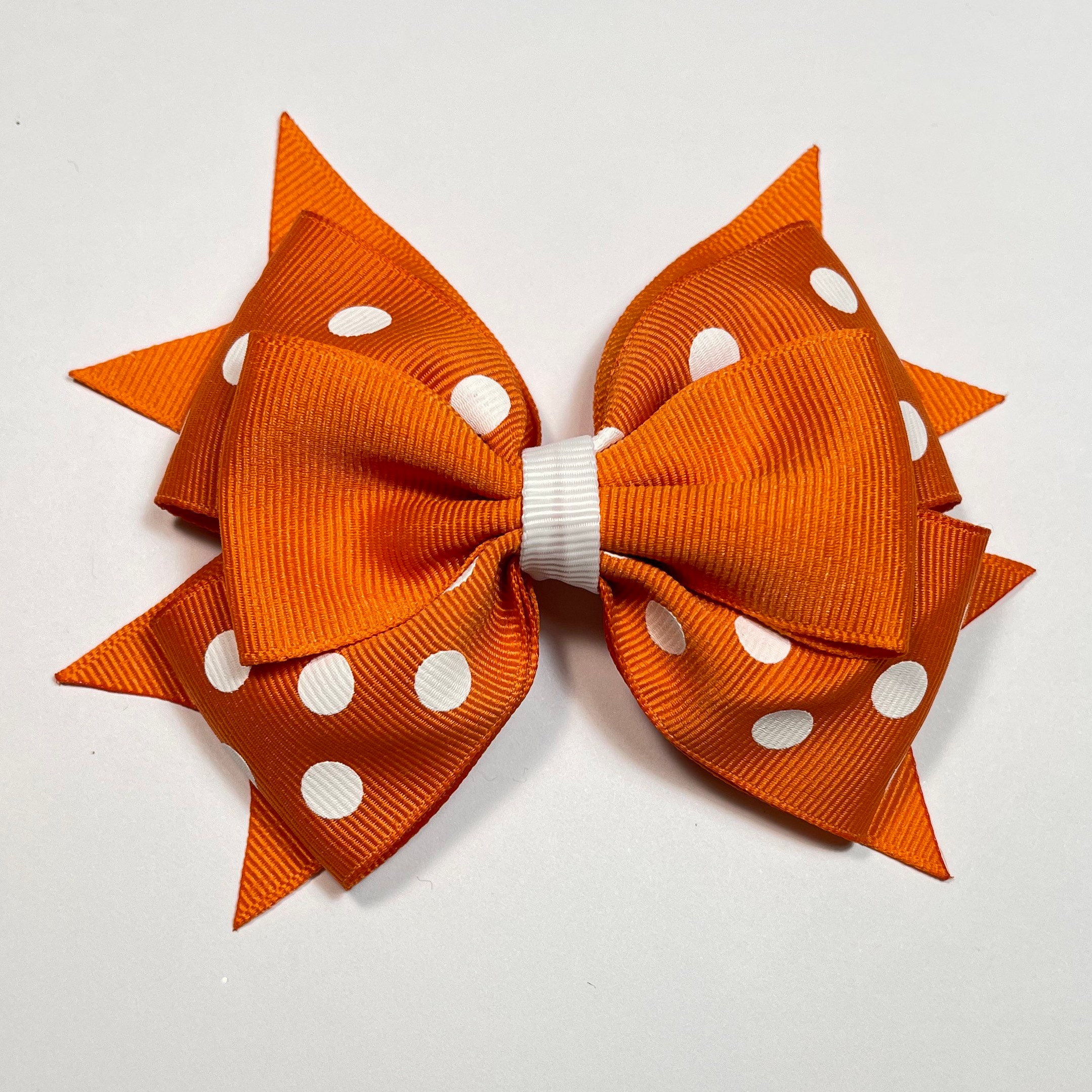 Hair bow. Orange hair bow. Polka dot hair bow. Etsy