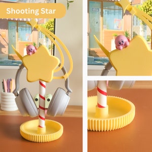 A yellow star-shaped headphone stand