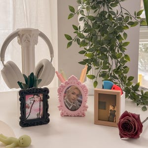 Portapenne per scambio di fototessere immagine 1