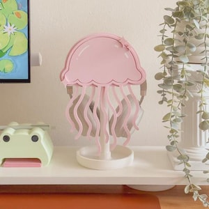 Soporte para auriculares con forma de medusa