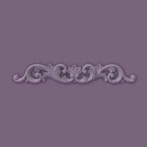 May include: A decorative, symmetrical, grey-purple scrollwork design. The ornate, three-dimensional element features swirling patterns, leaves, and rounded accents. The design is centered on a solid purple background, creating a classic, elegant aesthetic.