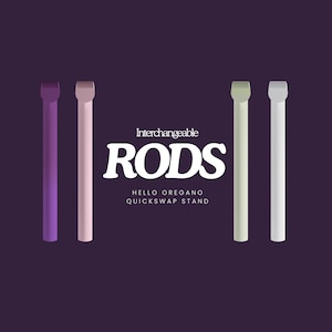 May include: Four interchangeable rods in purple, pink, light green, and light gray. The rods are displayed against a dark purple background. The text "Interchangeable Rods" is displayed in white above the rods. The text "Hello Oregano QuickSwap Stand" is displayed in white below the rods.