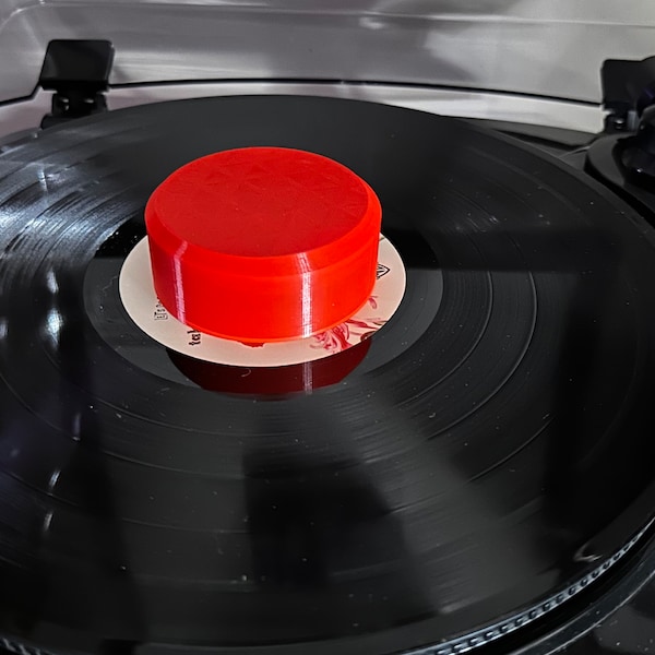 Adjustable weight for vinyl LP records